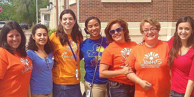 Romina Barral (3rd. from left to right) with members of Juntos Center.