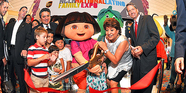 NCLR CEO Janet Murguia cuts the ribbon at a previous expo.